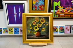 Sunflowers In Red Vase